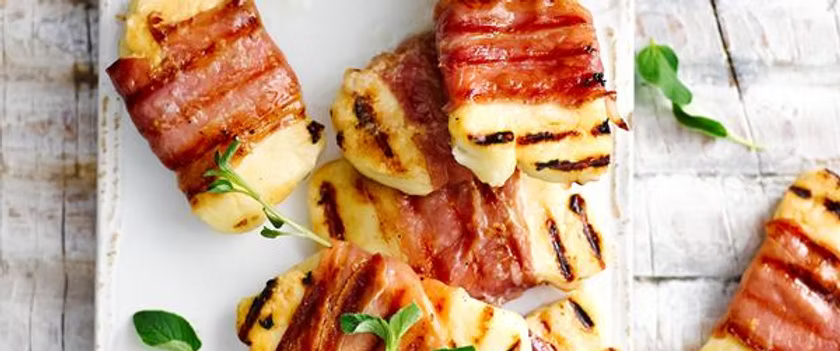 BEEF BACON-WRAPPED HALLOUMI WITH PEA SALAD